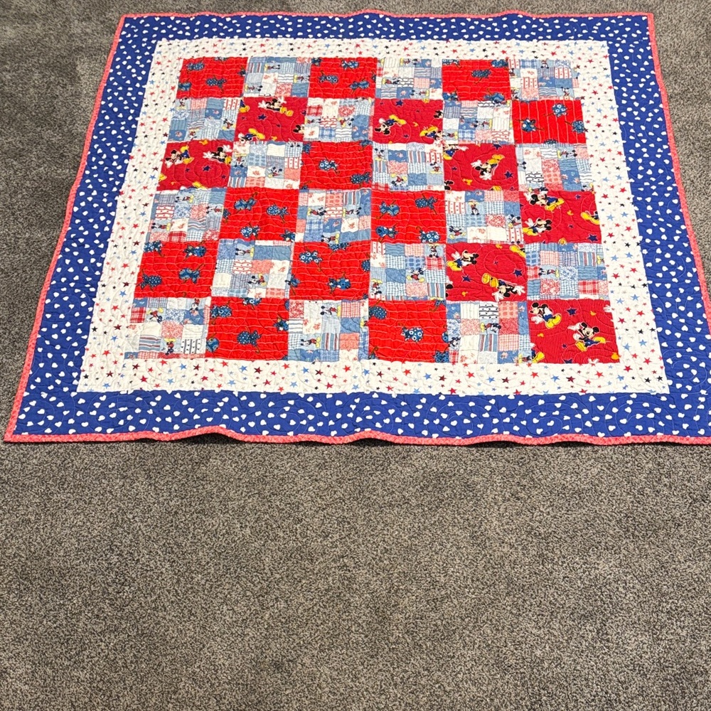 Handmade, vintage-style Mickey Mouse baby quilt perfect for nursery